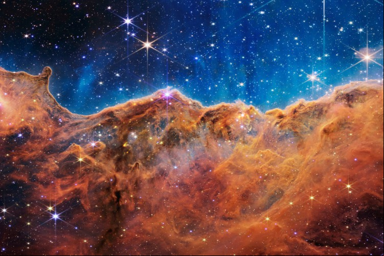 Esta imagem divulgada pela NASA do Telescópio Espacial James Webb mostra uma paisagem de