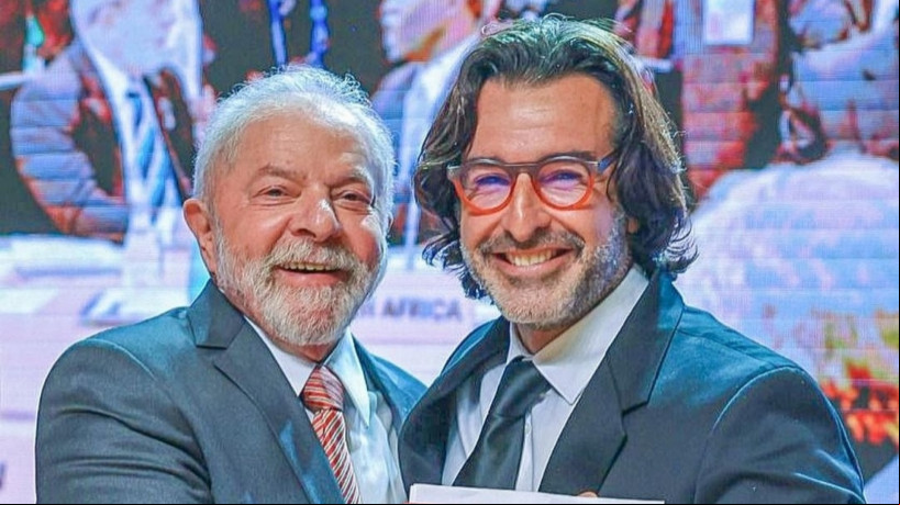 O presidente Lula e o fotógrafo Ricardo Stuckert no evento de lançamento do livro